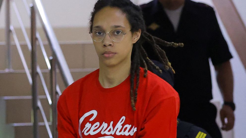 PHOTO: US basketball player Brittney Griner, who was detained in March at Moscow's Sheremetyevo airport and later charged with illegal possession of cannabis, is escorted before a court hearing in Khimki, outside Moscow, Russia July 7, 2022.  