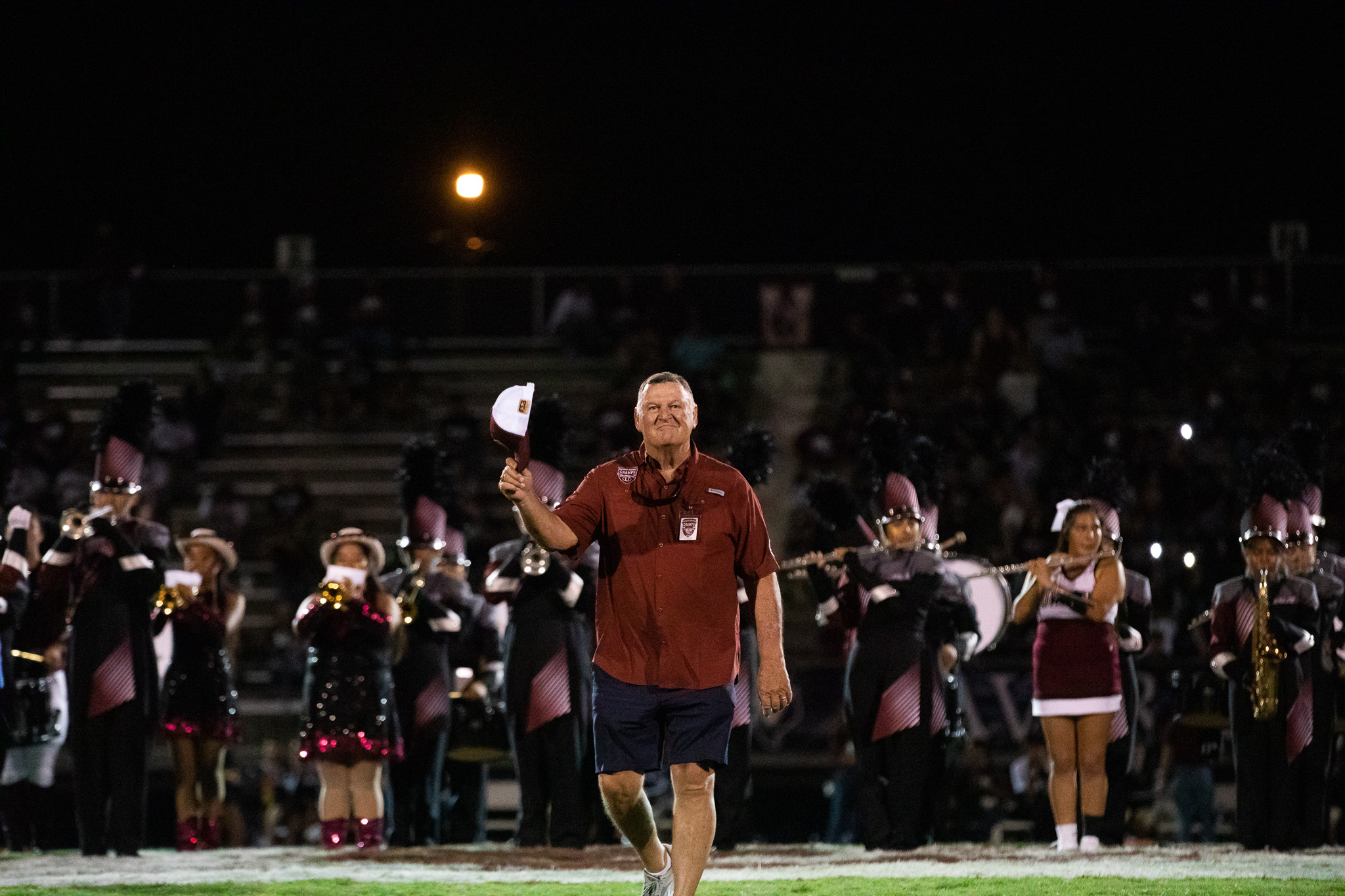PHOTO: Buck Lanning of the 1972 championship Uvalde football team takes the field on Sept 2, 2022.