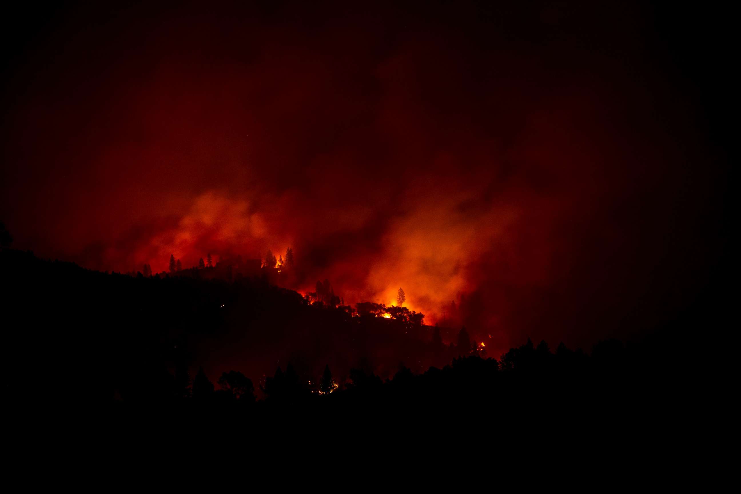 PHOTO: The Camp Fire burns along a ridge near Big Bend, Calif., Nov. 10, 2018. 