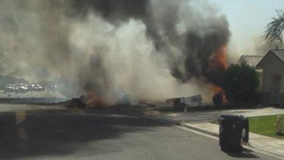 Smoke rises following a jet crash in Imperial, Calif., June 4, 2014.
