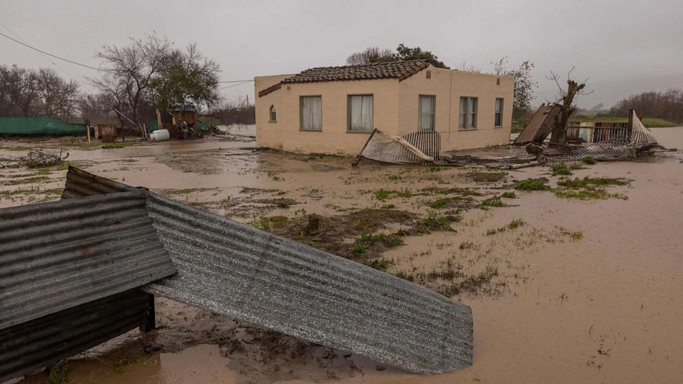 PHOTO: Flood waters inundate a home by the Salinas River near Chualar, California, on on January 14, 2023, as a series of atmospheric river storms continue to cause widespread destruction across the state.