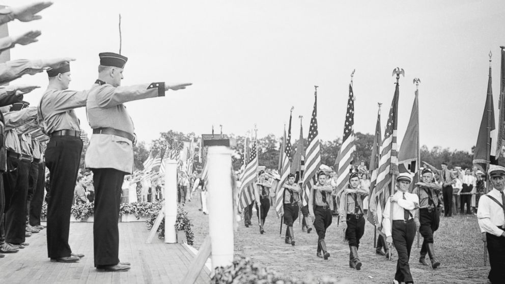 PHOTO:The leaders of German American Bund give the Nazi salute to young men and women marching in Nazi uniforms, Aug.29, 1937 in Yaphank, New York .  