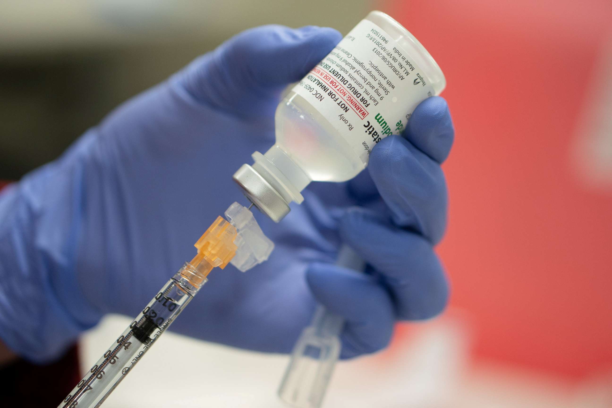 PHOTO: A mock vial of the Pfizer vaccine for the coronavirus disease (COVID-19) is shown during a staff vaccine training session at UW Health in Madison, Wisconsin, U.S., Dec. 8, 2020.