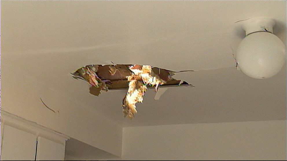 PHOTO: A jet wheel fell through the roof of a Montreal home, June 24, 2015.