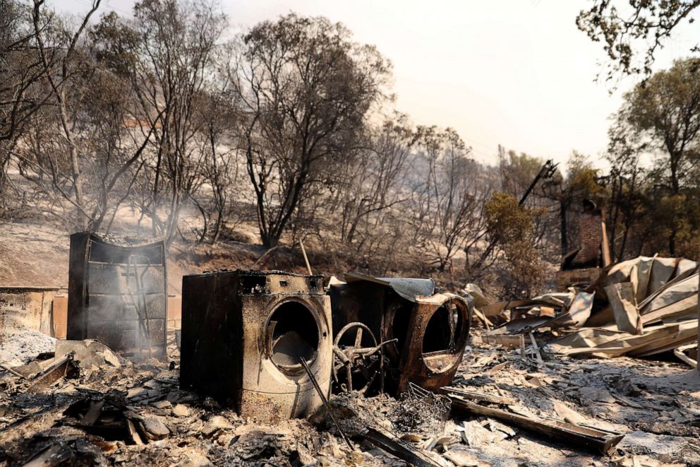 PHOTO: The remains of a burned home are seen after the Oak Fire moved through the area on July 23, 2022 near Mariposa, Calif. 
