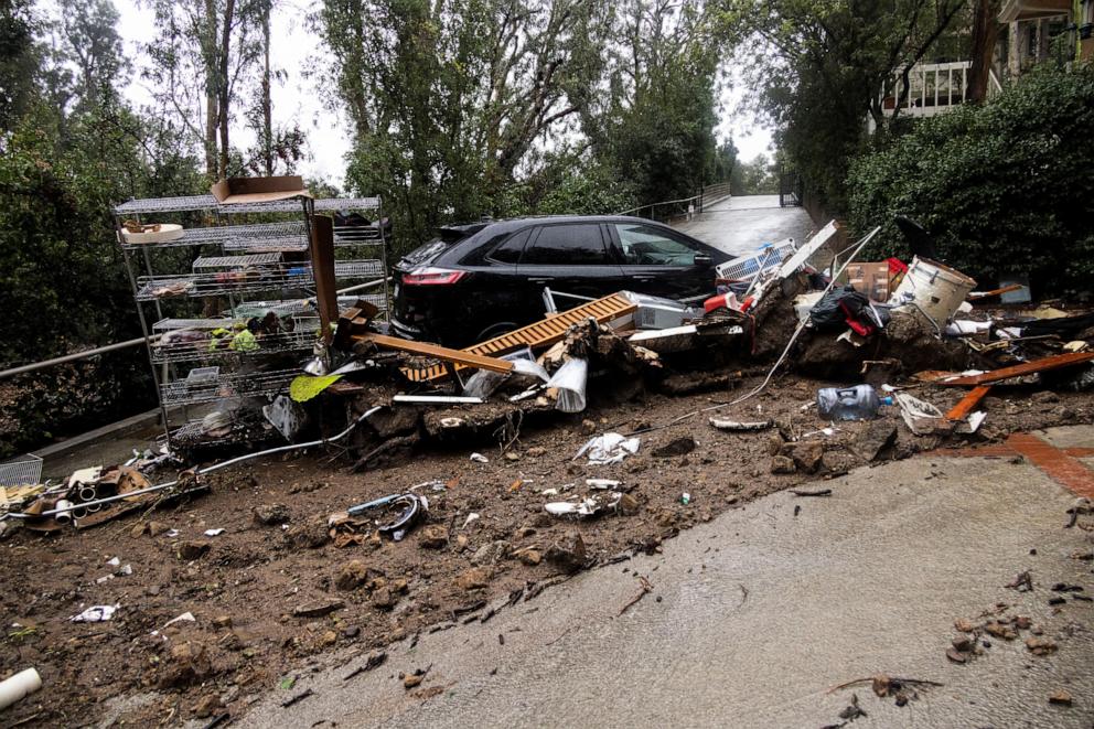 PHOTO:A car and various objects lay on the street during an ongoing rain storm in Studio City, CA, Feb. 5, 2024.  