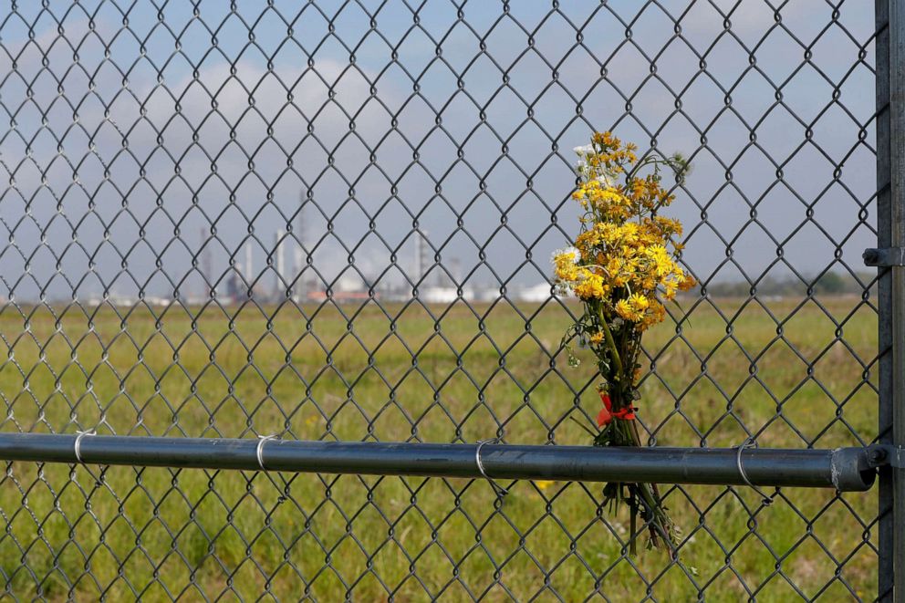 PHOTO: Flowers are placed on a fence at a burial ground after members of RISE St. James conducted a live stream video, on property owned by Formosa, in St. James Parish, La., March 11, 2020. 