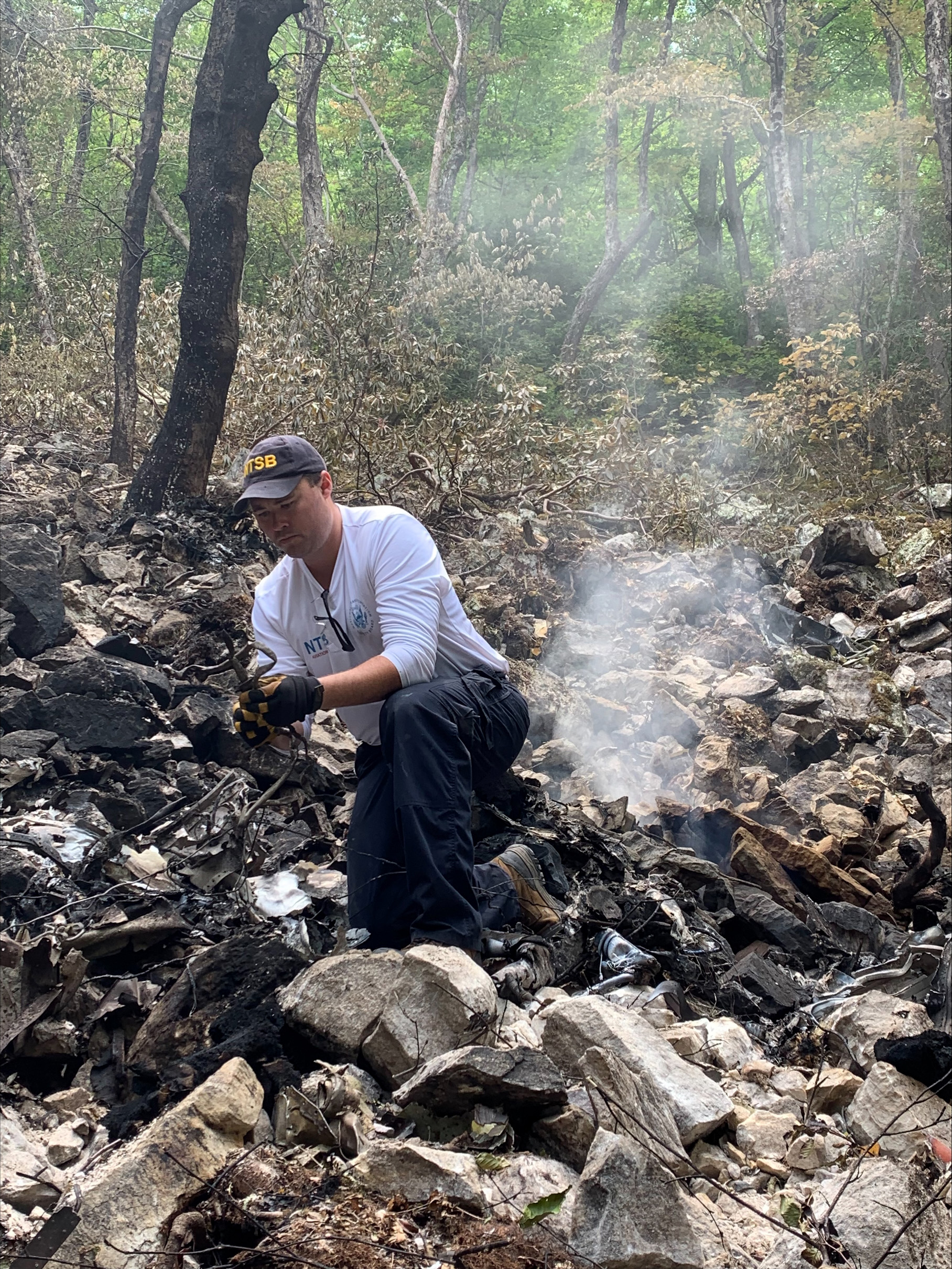 PHOTO: An investigator at the crash site of the Cessna in Virginia in a photo released by the National Transportation Safety Board.