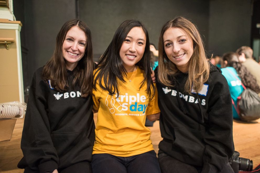 PHOTO: Charlotte Kim, center, poses with Bombas representatives.