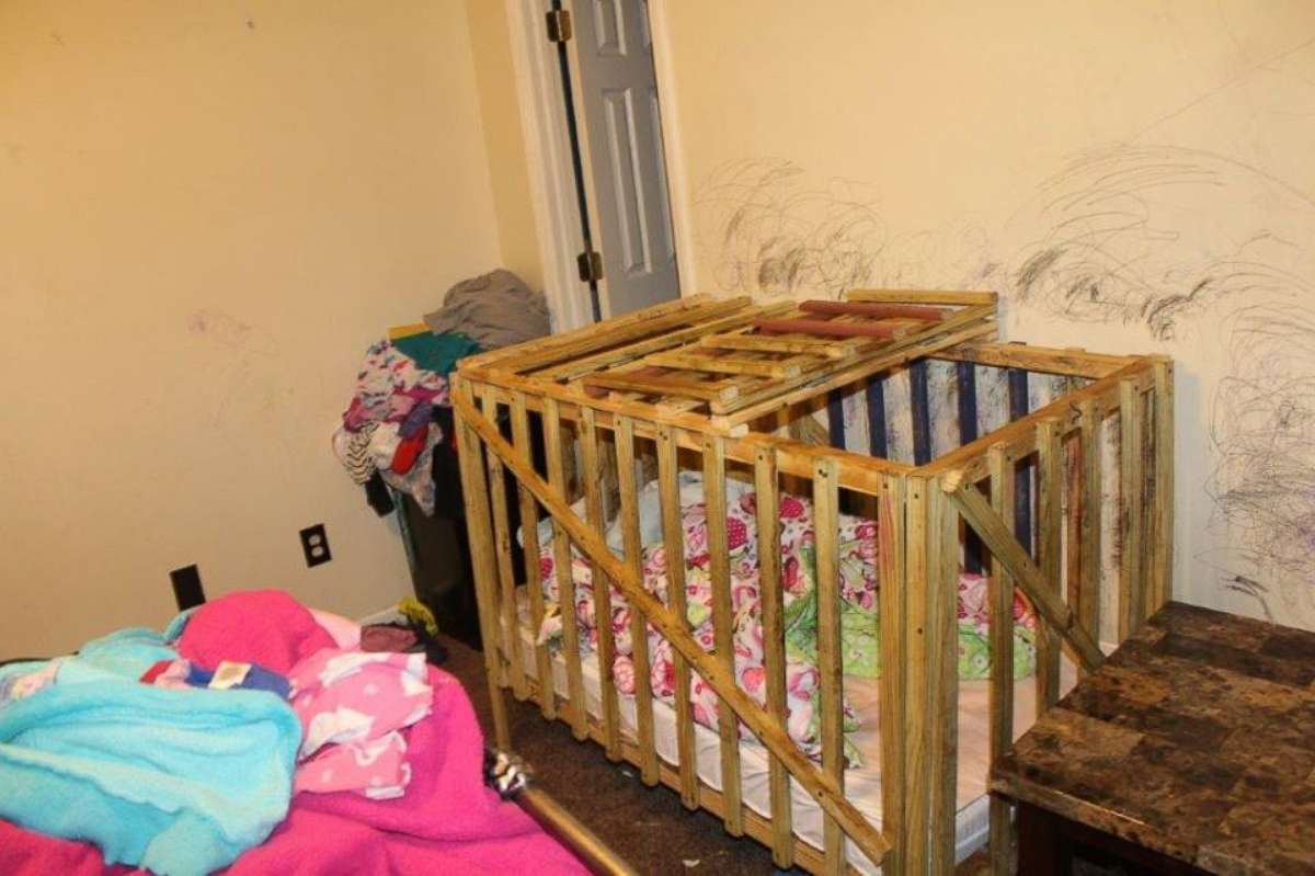 PHOTO: Investigators in Smiths Station, Alabama, conducted an investigation on Jan. 15, 2020 at a family home and discovered two wood constructed cages that had hasps and locks present. 