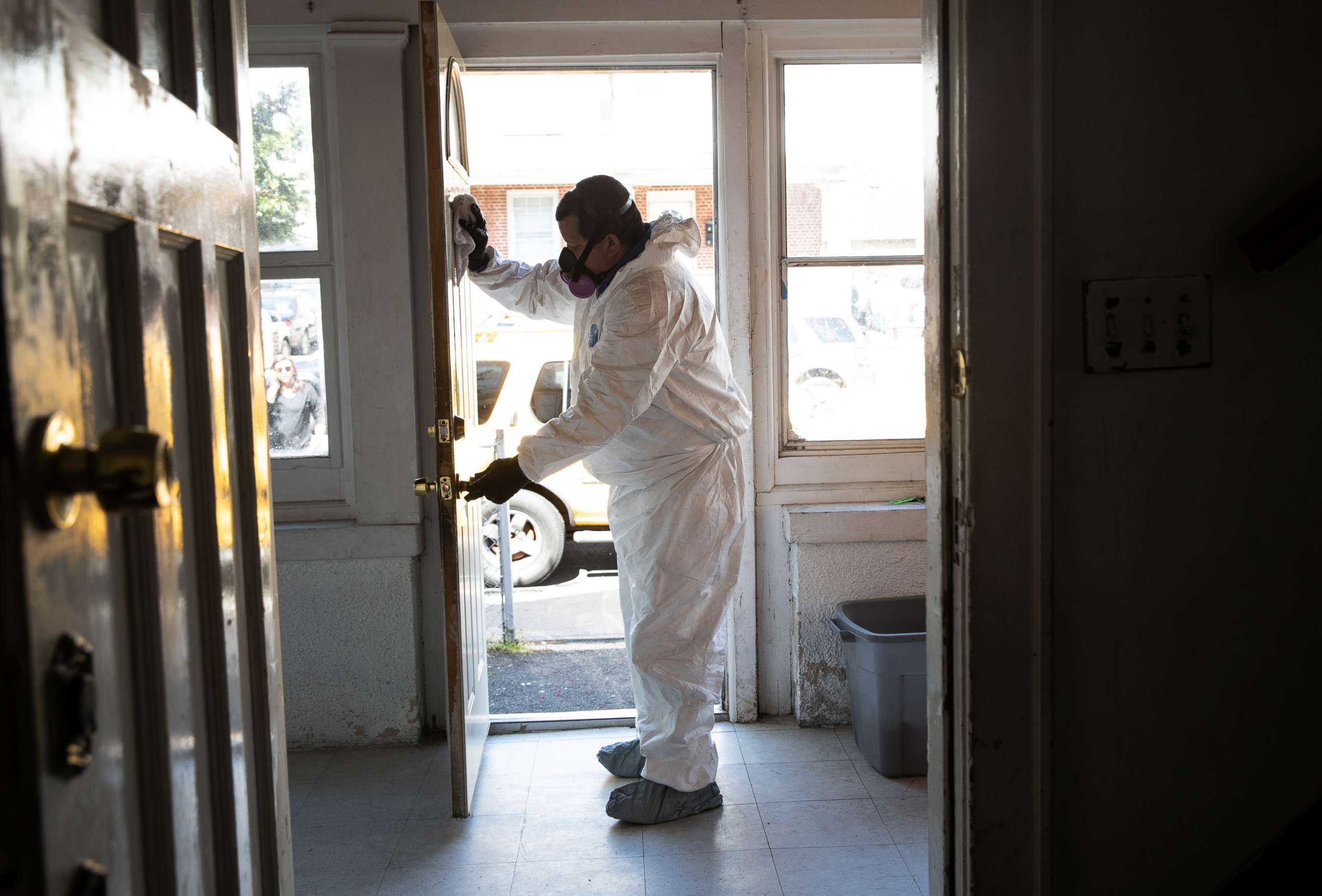 PHOTO: A cleaning technician wearing PPE deep cleans the home of a family on May 14, 2020 in Stamford, Connecticut. 