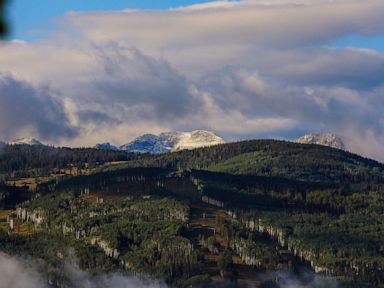 Millions under heat alerts out West, early snow expected in Colorado, Wyoming