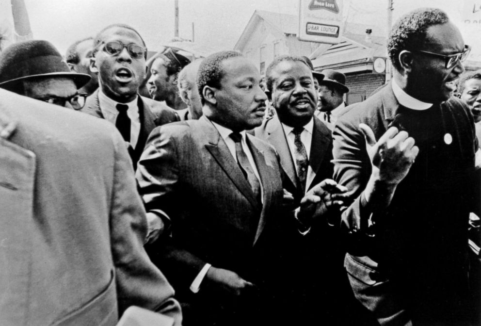 PHOTO: Dr. Martin Luther King Jr., center, leads the dignity march on behalf of striking sanitation workers March 28, 1968. Rev. Henry Starks (right) clears the way for Dr. King and Rev. Ralph Abernathy, before looting, violence and tear gas broke out.