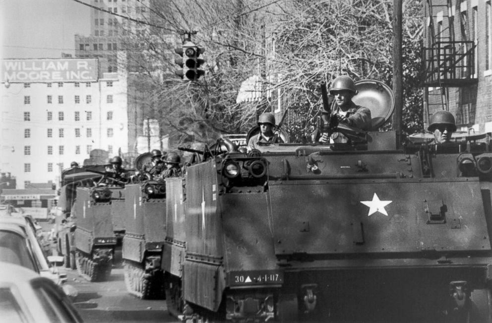 PHOTO: Tanks drive down the streets of Memphis, Tenn., following violence during the sanitation workers march for dignity led by Martin Luther King Jr., March 28, 1968. A state of emergency was declared, National Guard arrived and curfew was enacted.