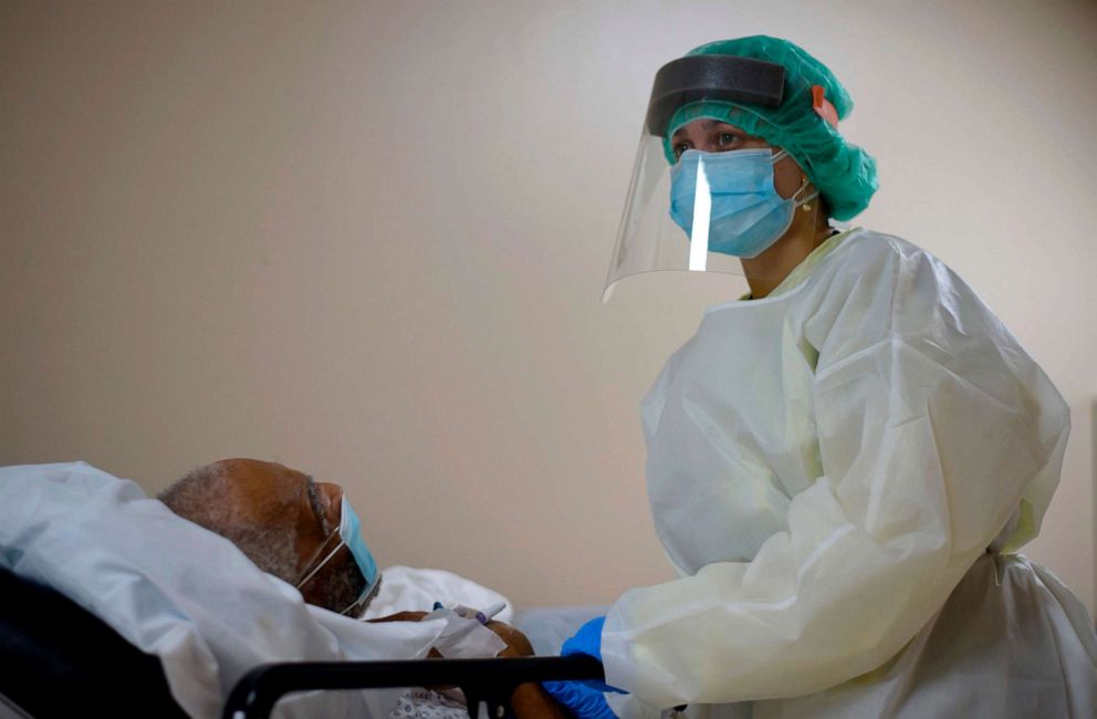 PHOTO: A healthcare worker tends to a patient in the Covid-19 Unit at United Memorial Medical Center in Houston, Texas, July 2, 2020. 