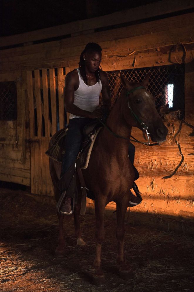 PHOTO: A cowboy named Kyran poses for a portrait at his horse barn near Cleveland, Miss.