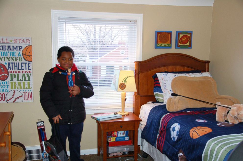 PHOTO: Daerye Neely, 8, shows off his new room in Detroit.