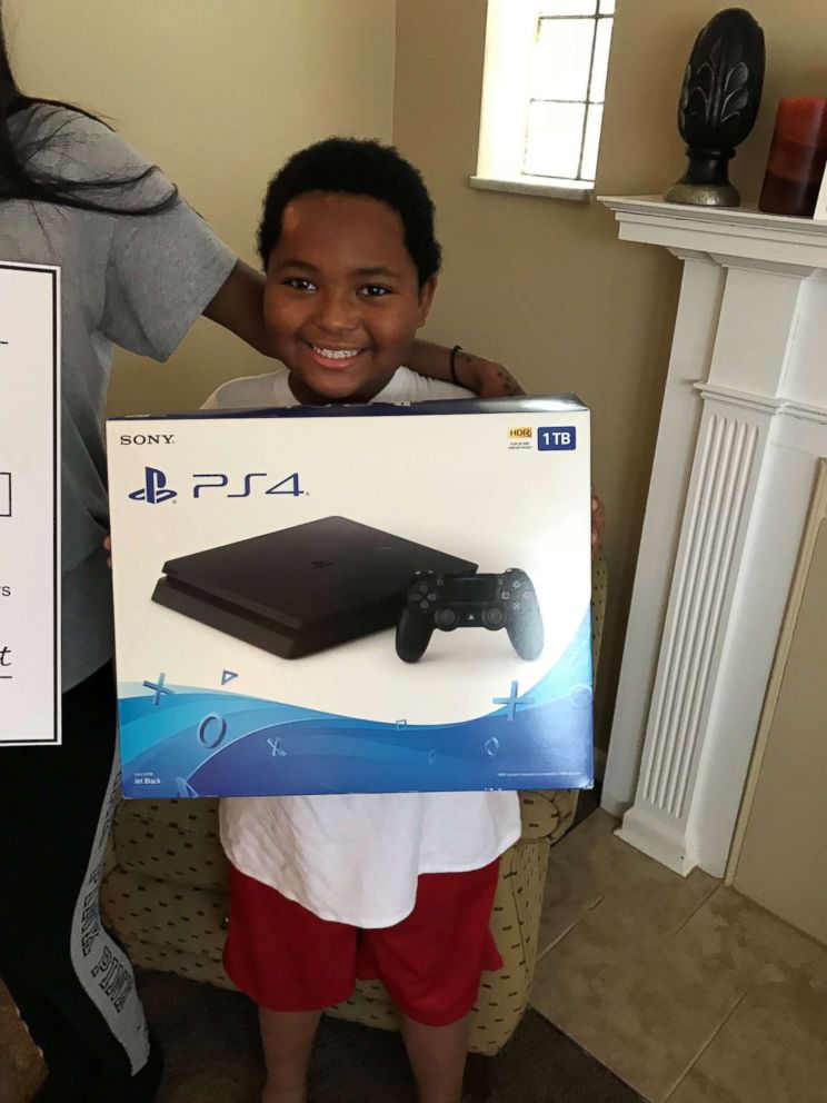 PHOTO: Daerye Neely was presented with a PlayStation 4 Jan. 12 by U-Haul and Humble Design.