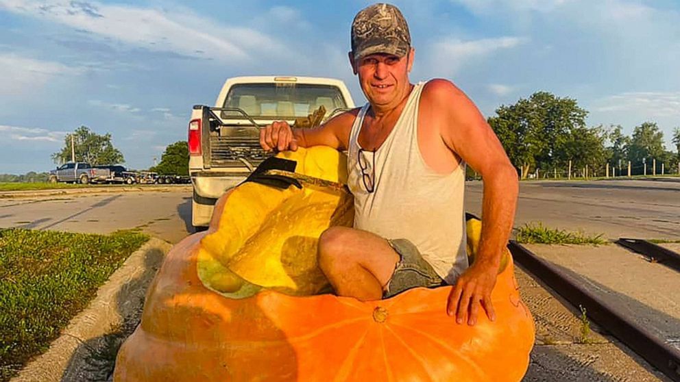 PHOTO: Duane Hansen sits in an 846-pound pumpkin boat that he sailed down the Missouri River from Bellevue to Nebraska City, Neb.
