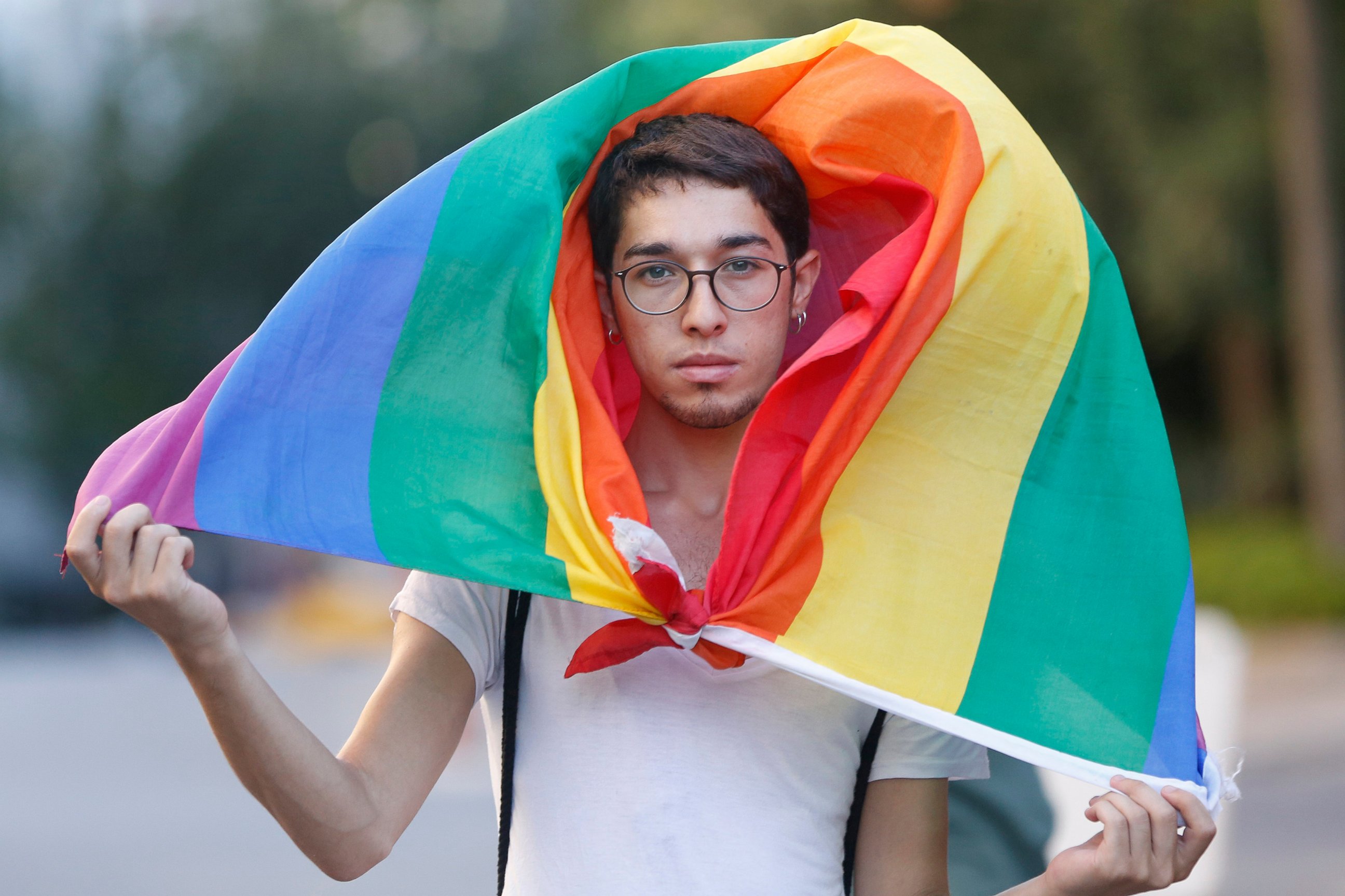 PHOTO: A participant walks with the rainbow flag during Istanbul LGTB Pride Parade which was cancelled due to security concerns by the governor of Istanbul, in Istanbul, June 25, 2017. 