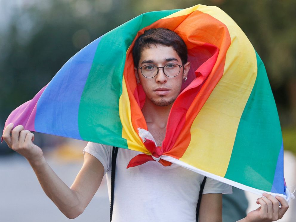 PHOTO: A participant walks with the rainbow flag during Istanbul LGTB Pride Parade which was cancelled due to security concerns by the governor of Istanbul, in Istanbul, June 25, 2017.