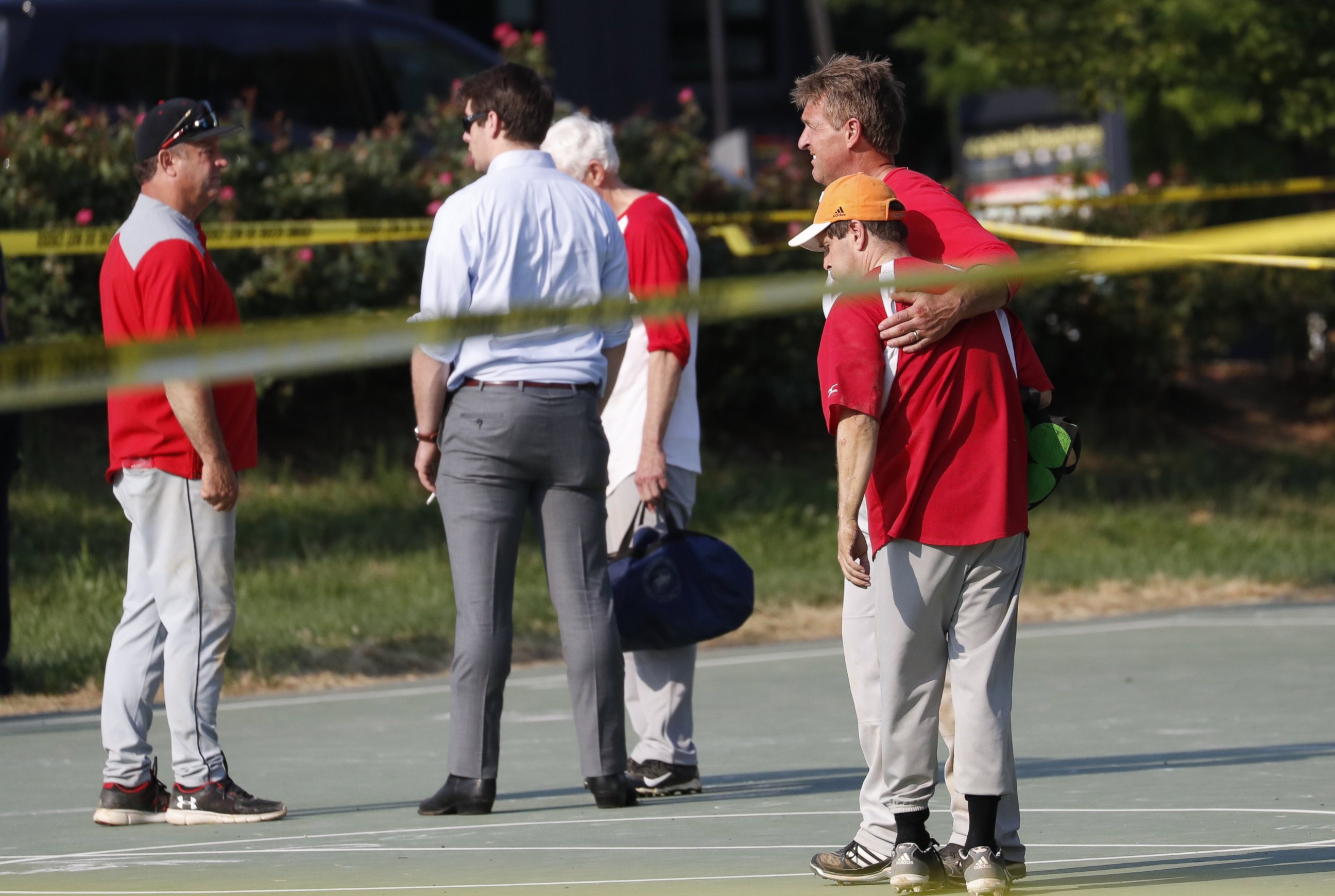 PHOTO: Republican Senator from Arizona Jeff Flake hugs another member of the Republican congressional baseball team following a shooting in Alexandria, Va., June 14,  2017.