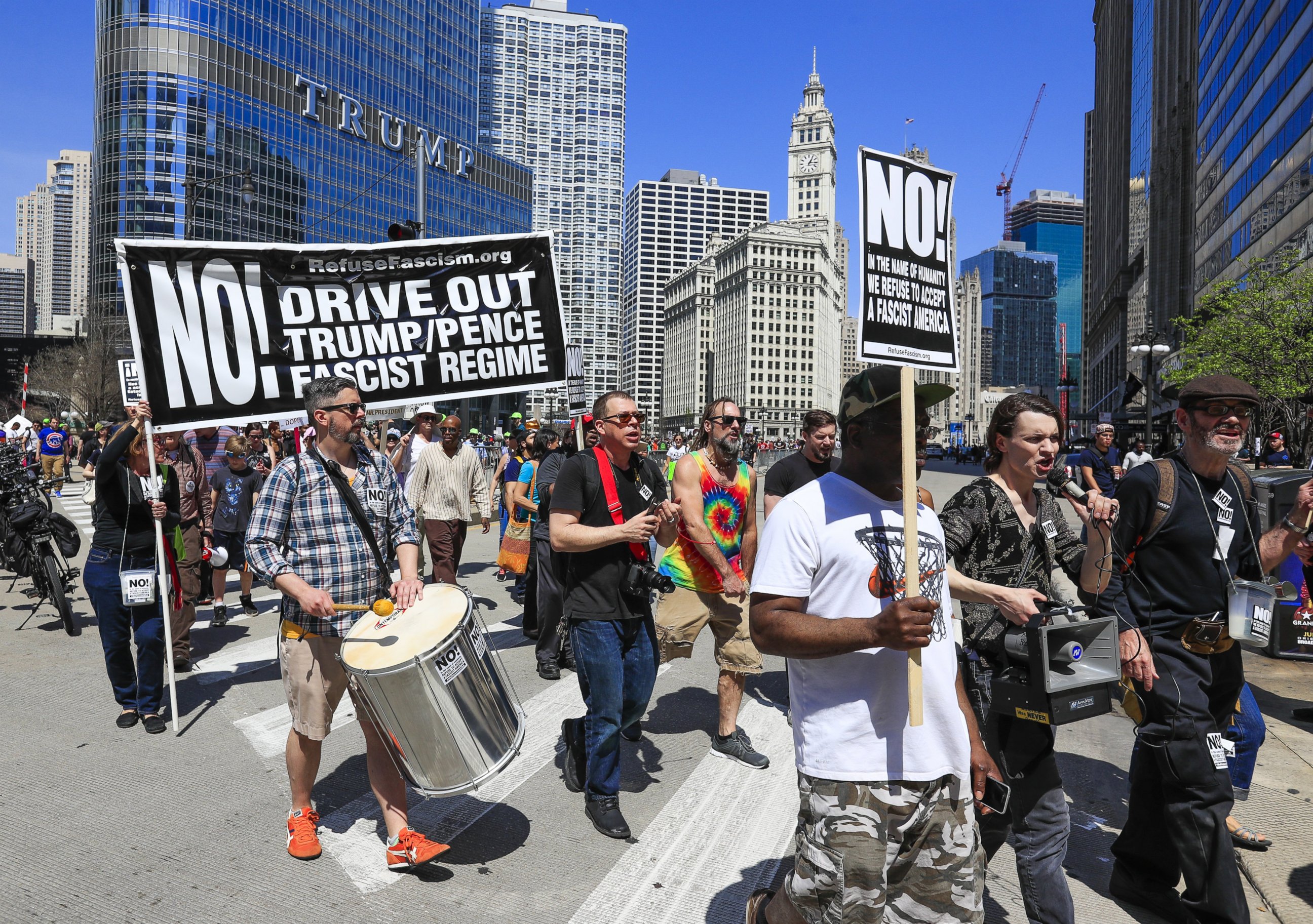 PHOTO: Protesters march and rally near Trump Tower calling for President Donald Trump to release his tax returns to the public in Chicago, April 15, 2017. 