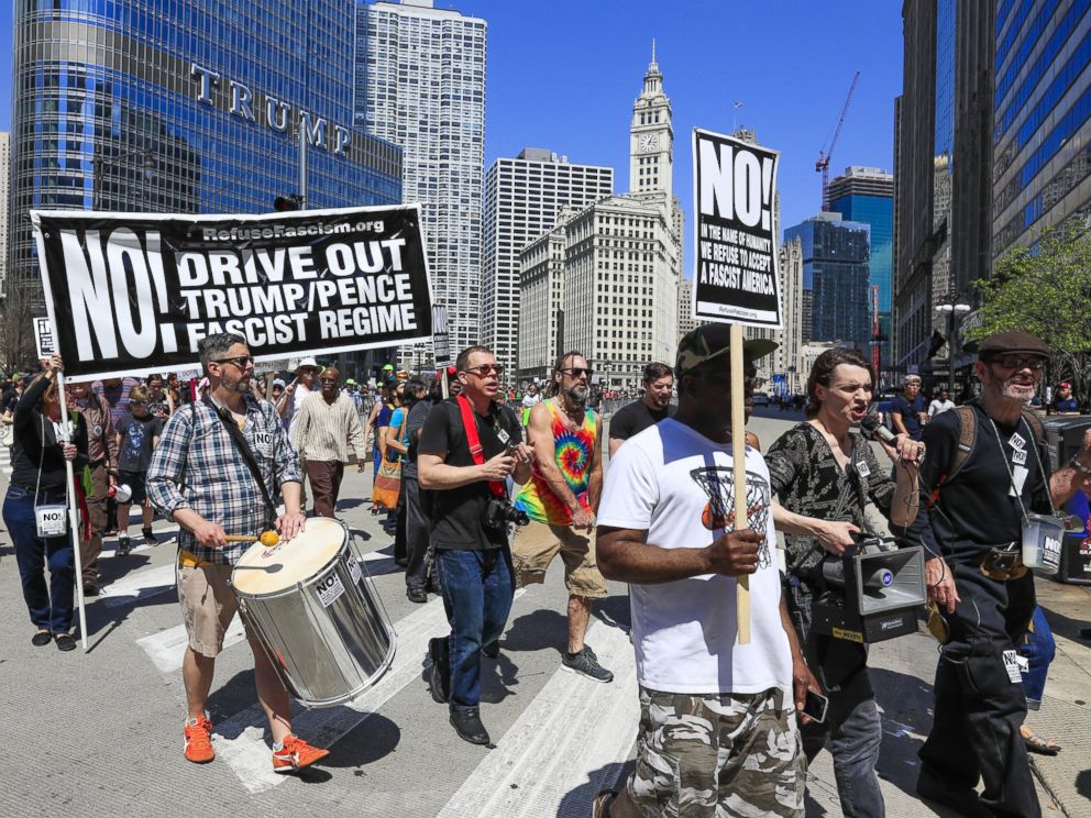 PHOTO: Protesters march and rally near Trump Tower calling for President Donald Trump to release his tax returns to the public in Chicago, April 15, 2017.