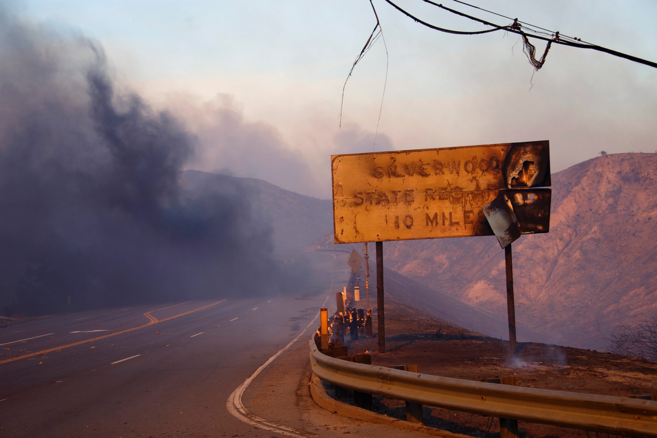 PHOTO: A melted sign shows the damage after a wildfire swept through Cajon Junction, California, Aug. 16,  2016.