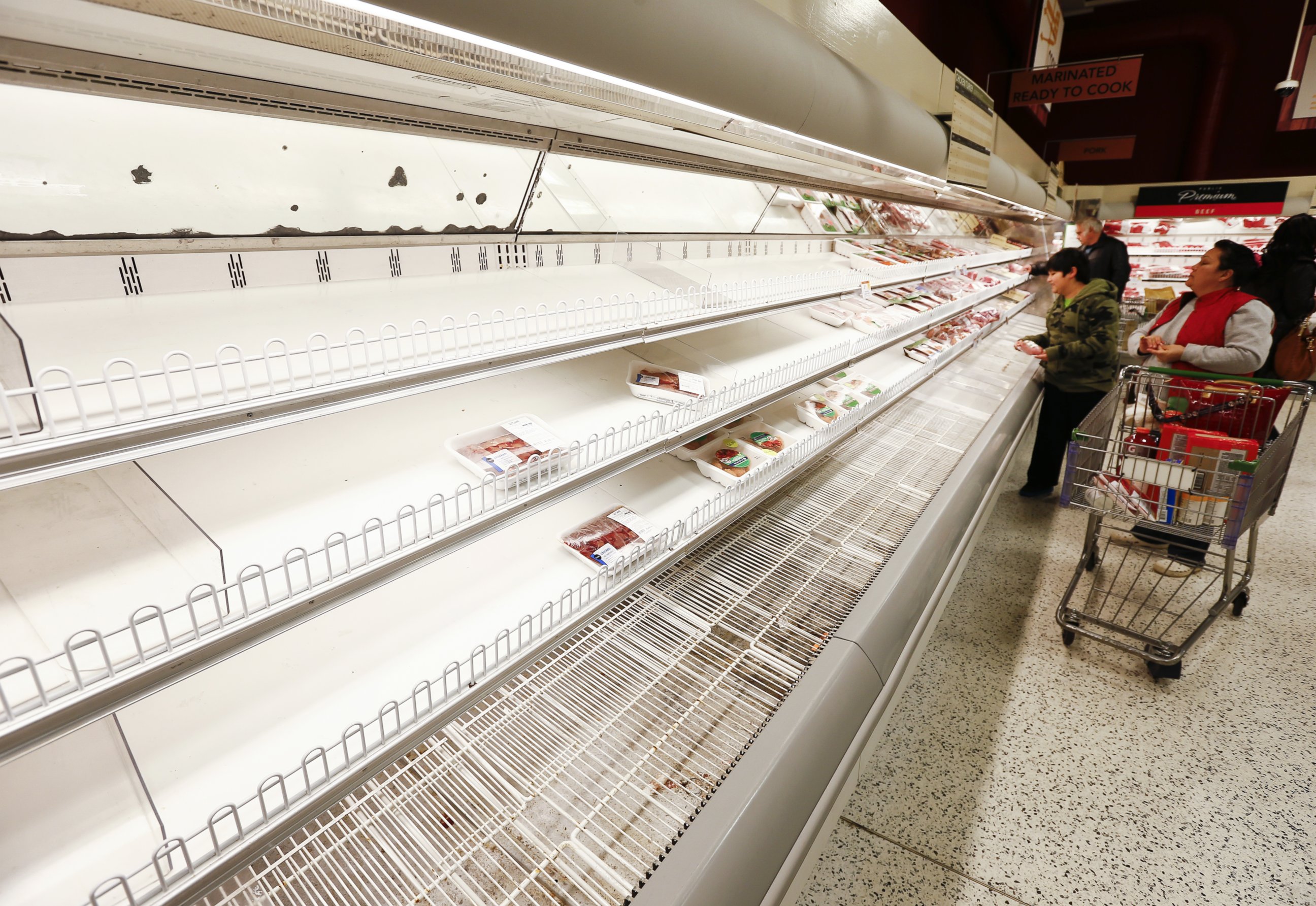 PHOTO: A Publix grocery store's depleted shelves are seen ahead of a predicted winter storm to hit metro Atlanta, in Decatur, Ga., Feb. 11, 2014.