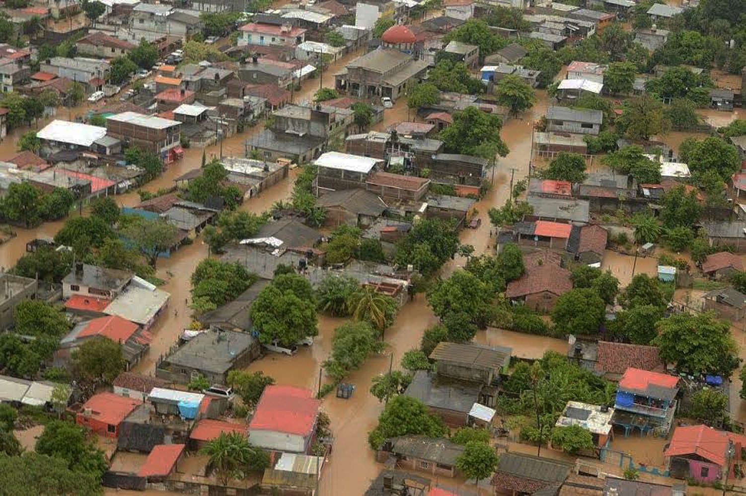 PHOTO: A handout photo made available by the Mexican Information Agency Quadratin on Sept. 6, 2016 shows an aerial view of a zone affected by a flooding caused by heavy rains from hurricane 'Newton' in Benito Juarez, Mexico, Sept. 5, 2016.