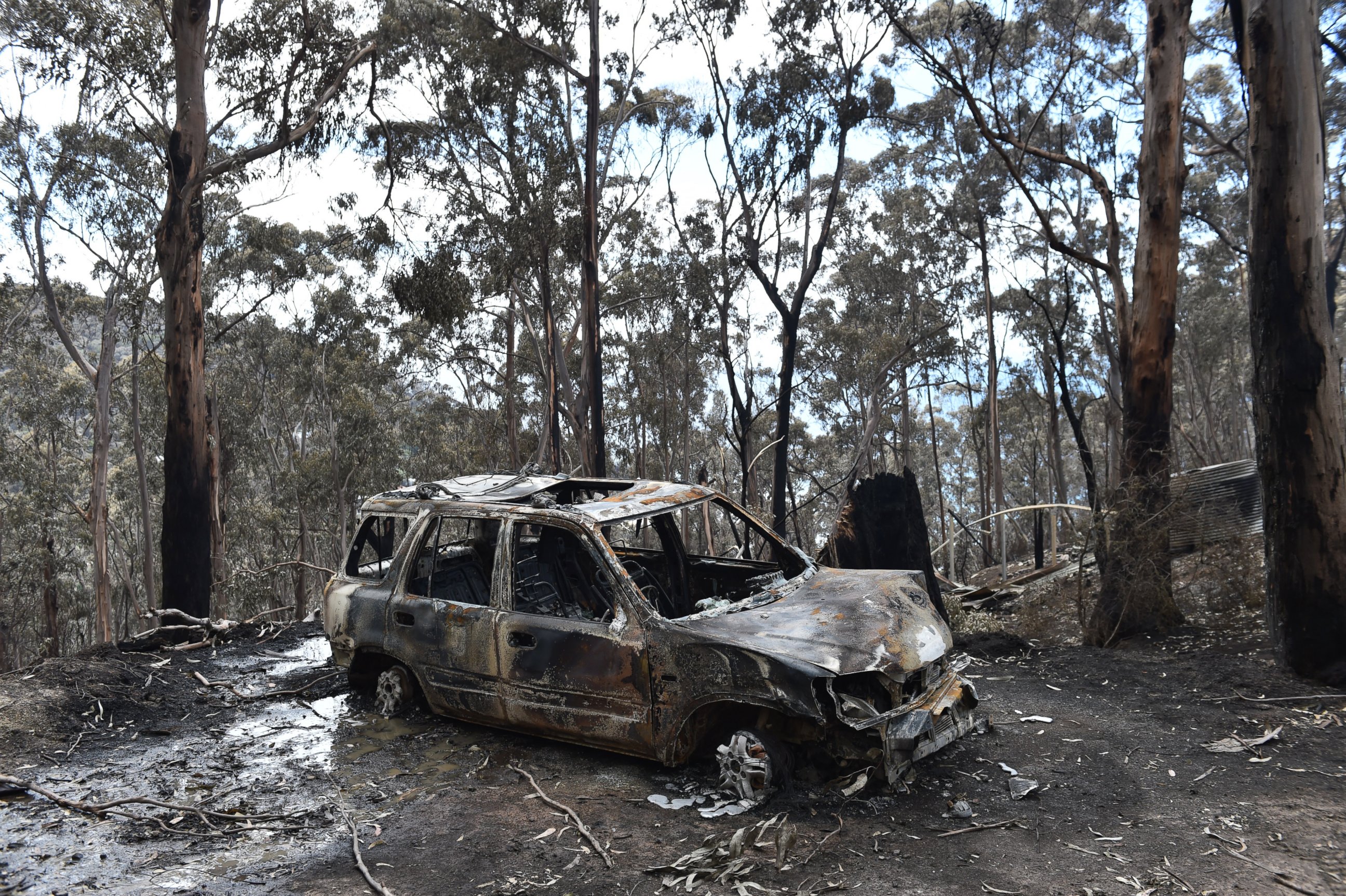 PHOTO:A fire damaged car is seen at Wye River in the Otway Ranges south of Melbourne, Australia, Dec. 27, 2015.  