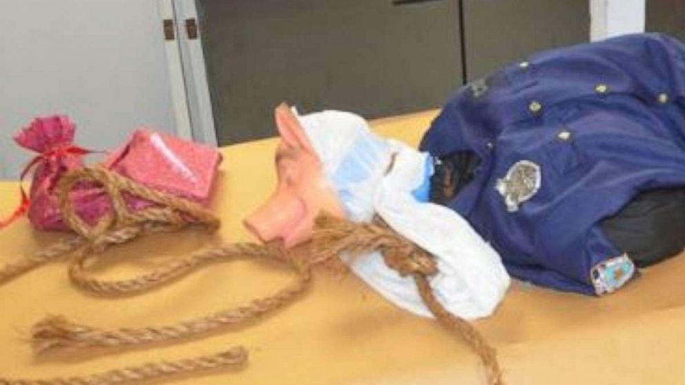 PHOTO: A mock lynching of a mannequin wearing a police officer’s uniform and a pig mask has been found hanging over an overpass on I-95 near Jacksonville, Florida on June 20, 2020.  
