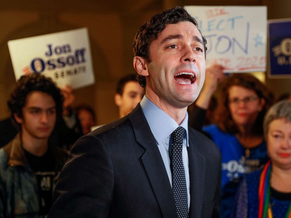 PHOTO: FILE - In this Wednesday, March 4, 2020, file photo, Jon Ossoff speaks to the the media and supporters after he qualified to run in the Senate race against Republican Sen. David Perdue in Atlanta. 