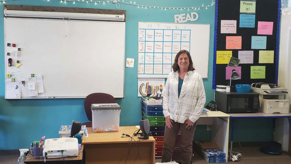 PHOTO: Elizabeth "Liz" Pyles is a Reach University teacher candidate and classroom aide at Golden Eagle Charter School in California's Mount Shasta. She is pictured in her classroom.