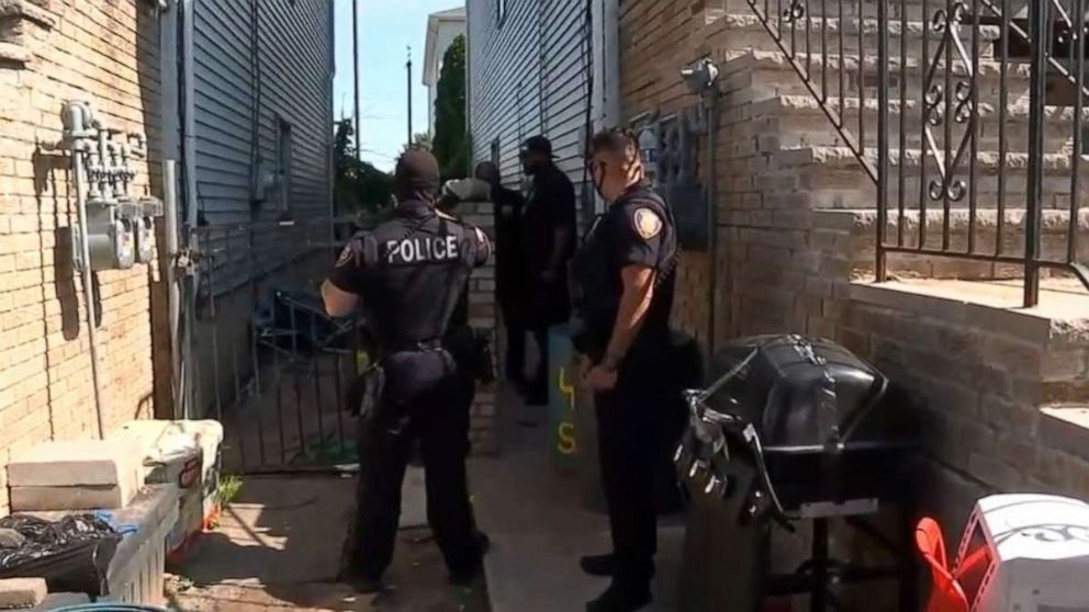 PHOTO: Police attend to the scene in Elizabeth, New Jersey, after a 3-year-old boy died falling out of a window at his family home and was then attacked and mauled to death by the family’s two pit bulls when he landed in the backyard on June 10, 2021.