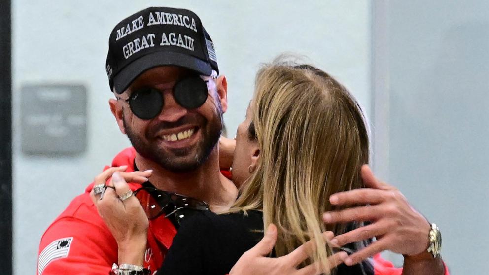 PHOTO: Henry "Enrique" Tarrio is greeted by his mother Zuny Duarte as he arrives at Miami Airport after his release from prison, in Miami, Jan. 22, 2025.