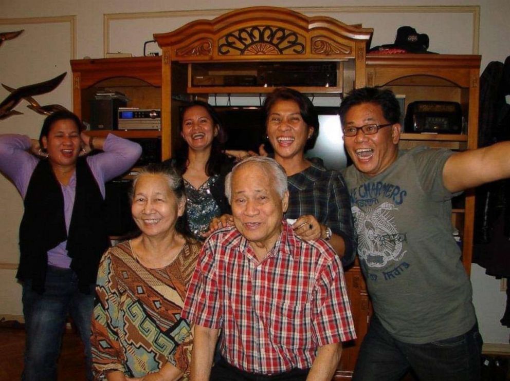 PHOTO: Erwin Lambrento, right, celebrates with his family in an undated photo. 