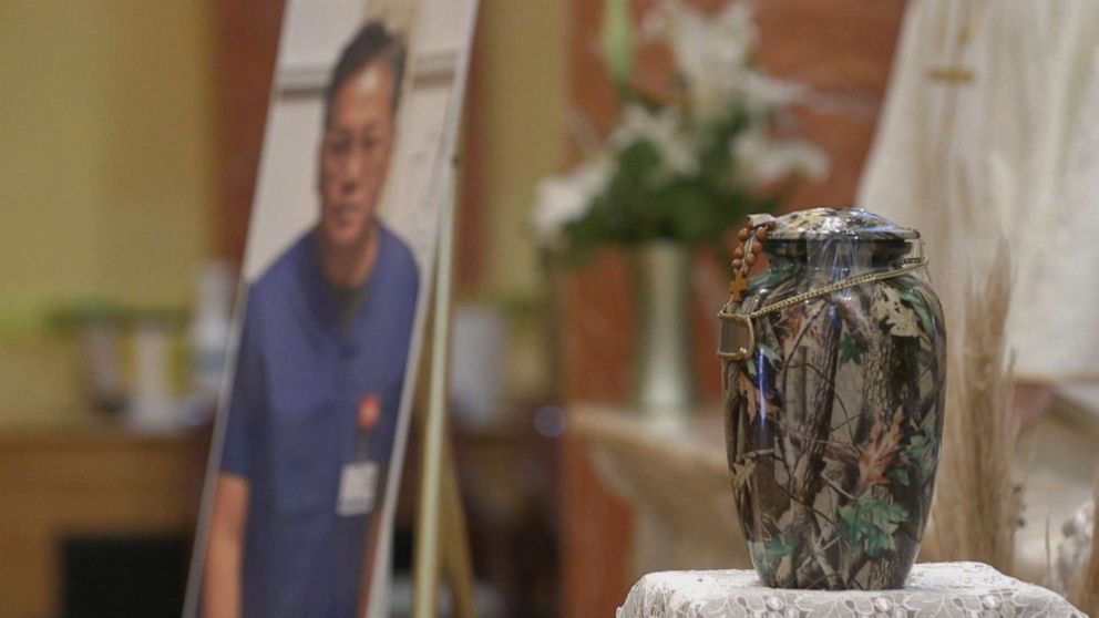 PHOTO: The urn carrying the remains of Erwin Lambrento rests on an altar next to a picture of the emergency room nurse at a memorial service in Queens, New York.