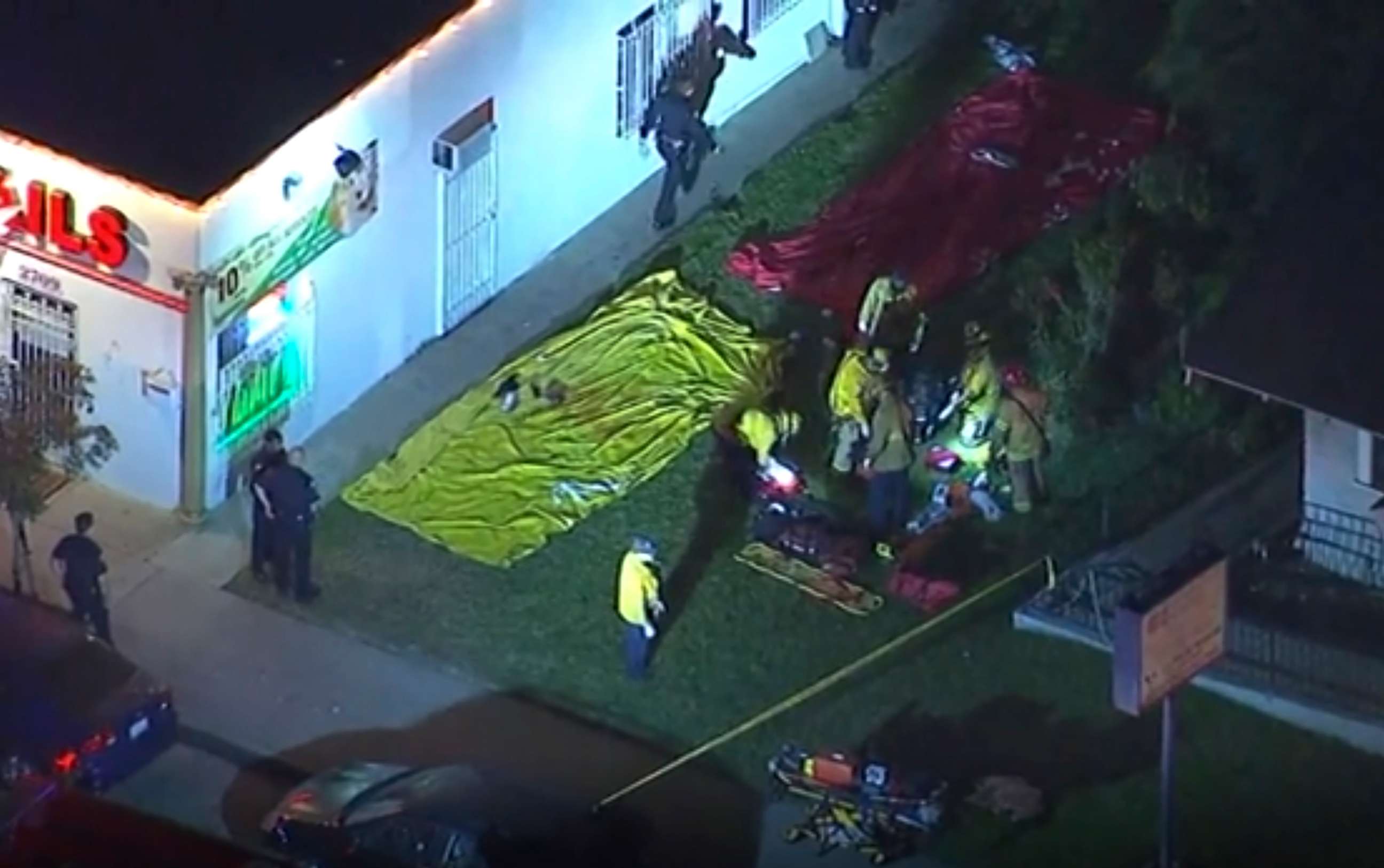 PHOTO: In this aerial image made from video shows the scene where emergency workers have cordoned off an area to deal with victims of a shooting, early Wednesday, Oct. 30, 2019, in Long Beach, Ca. (KABC via AP)