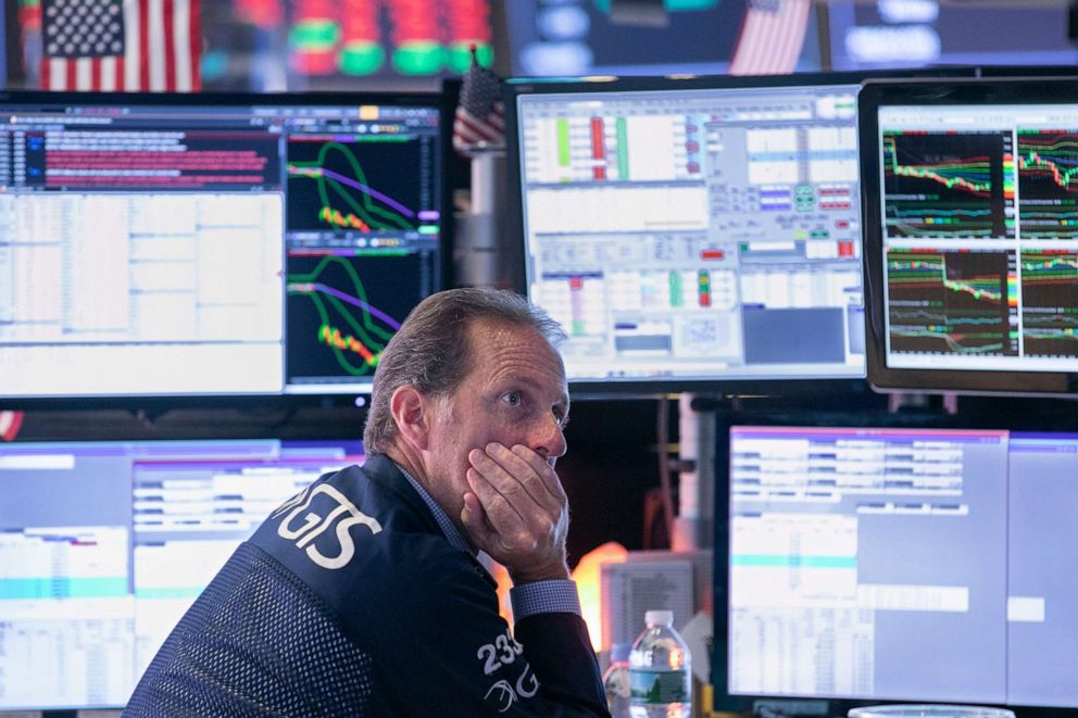 PHOTO: Specialist Glenn Carrel works at his post on the floor of the New York Stock Exchange, Aug. 14, 2019.