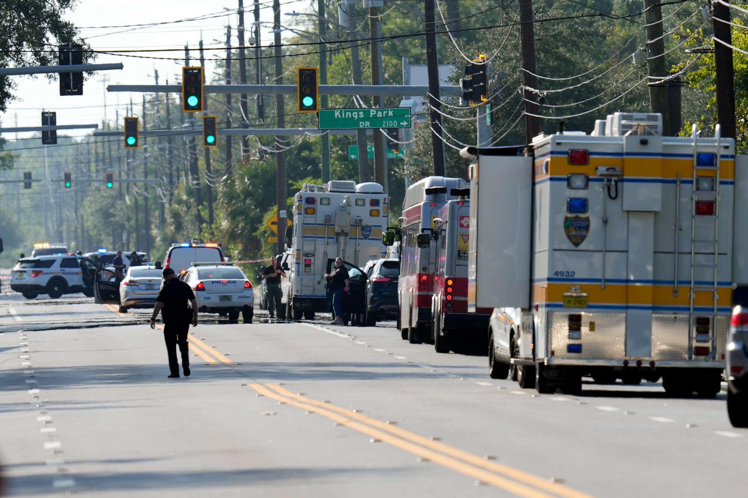 PHOTO: Authorities respond to the scene of a mass shooting at a Dollar General store, Saturday, Aug. 26, 2023, in Jacksonville, Fla. (AP Photo/John Raoux)
