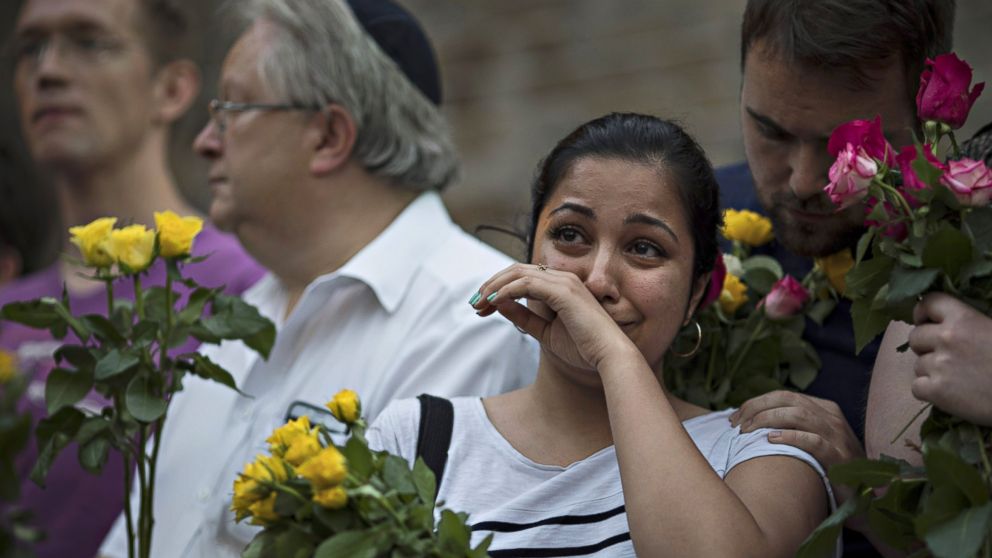 A woman cries during a vigil near the Finsbury Park Mosque in London, on June 19, 2017. Worshippers were struck by a hired van as they were leaving the mosque after Ramadan prayers. One person was died during the terror attack and 10 people were injured.  