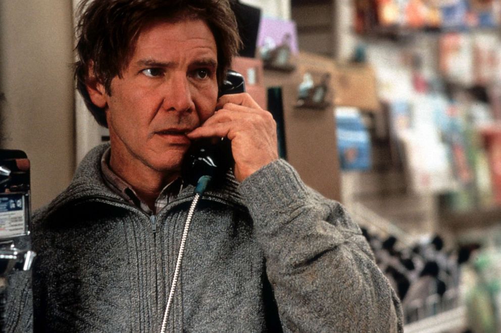 PHOTO: Harrison Ford talks on a pay phone in a scene from the 1993 film "The Fugitive."