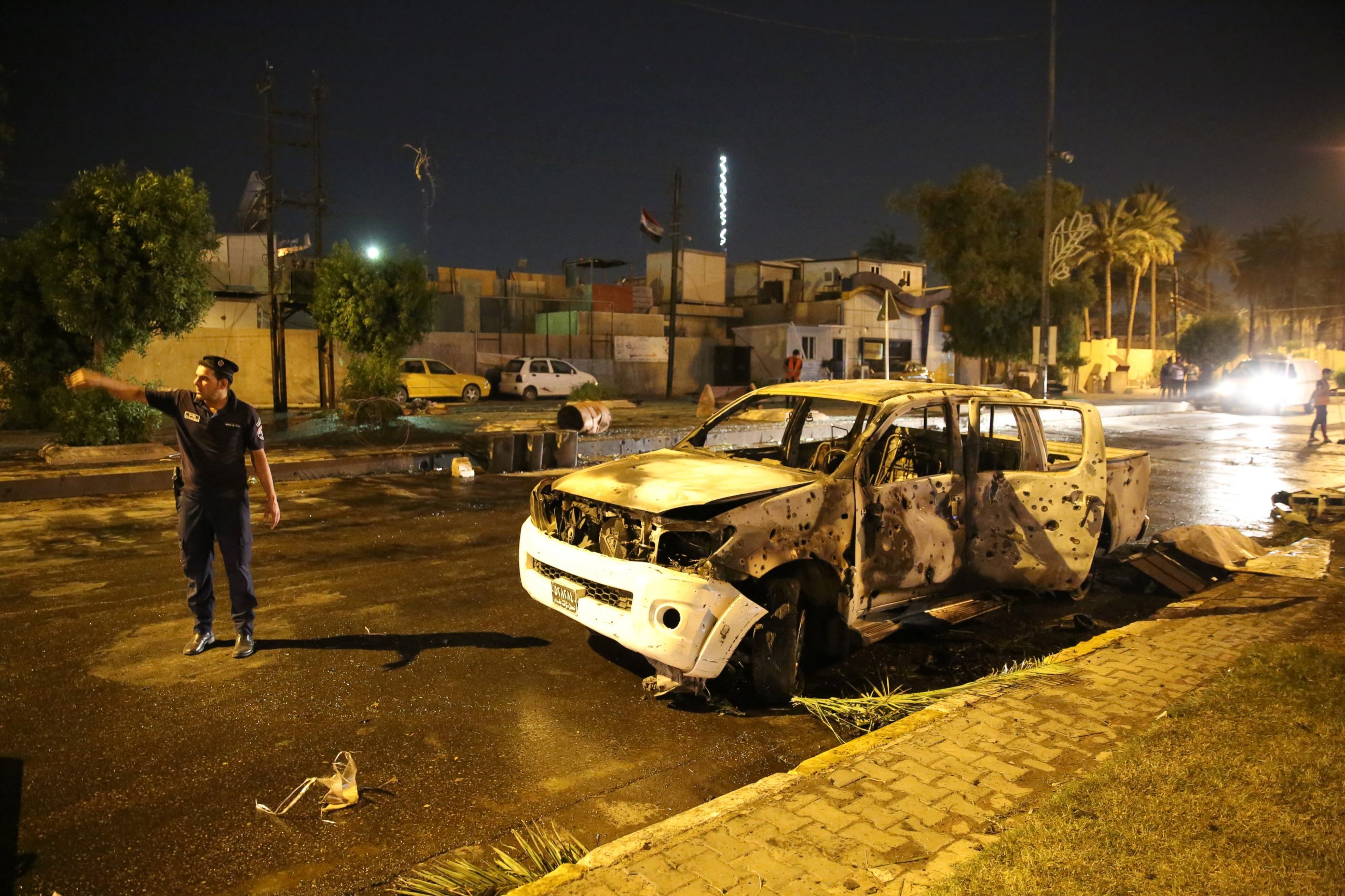 PHOTO: Security forces cordon the area after a road-side parked car-bomb attack in Karrada district of Baghdad, Iraq on May 29, 2017. 