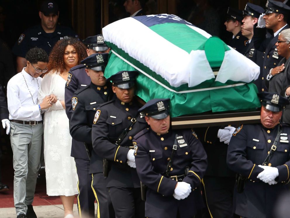 PHOTO: The casket of fallen NYPD Officer Miosotis Familia is brought outside of a Bronx church after she was shot and killed last week in what police have called "an unprovoked attack" in the Bronx, on July 11, 2017, in New York City.