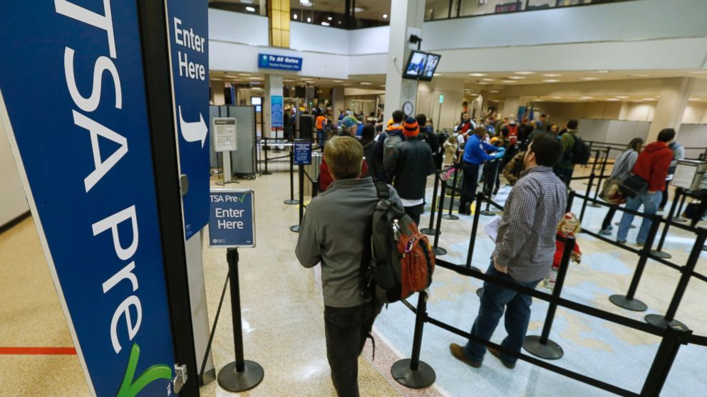 PHOTO: A passenger enters the Transportation Security Administration (TSA) pre-check line towards a security check point at Salt Lake City International Airport in Salt Lake City, on Dec. 23, 2014.
