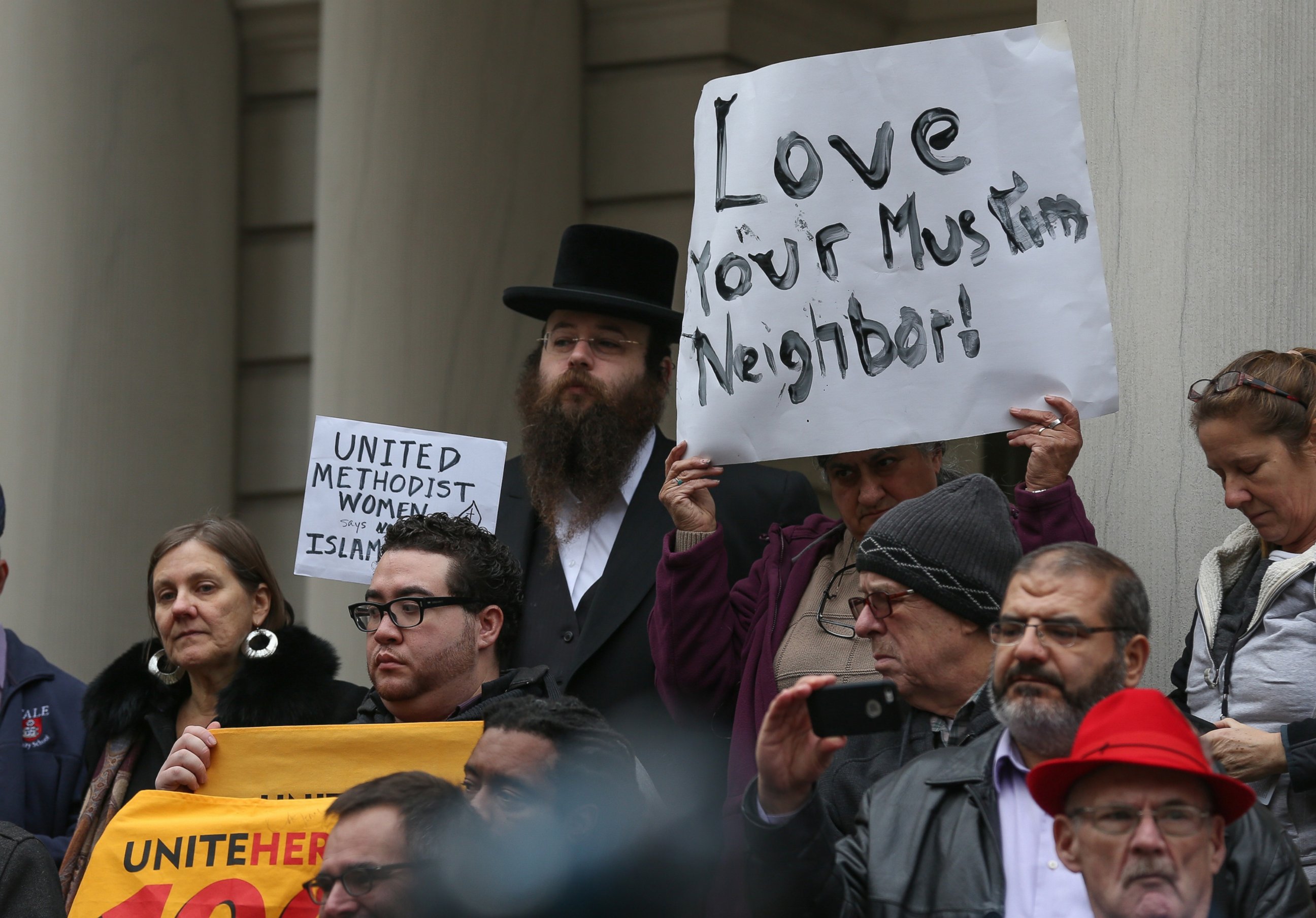 PHOTO: Religious leaders from varied religions and beliefs hold a joint press release during a protest against hate speech of Republican presidential candidate Donald Trump in front of New York City Hall, Dec. 9, 2015, in New York City.