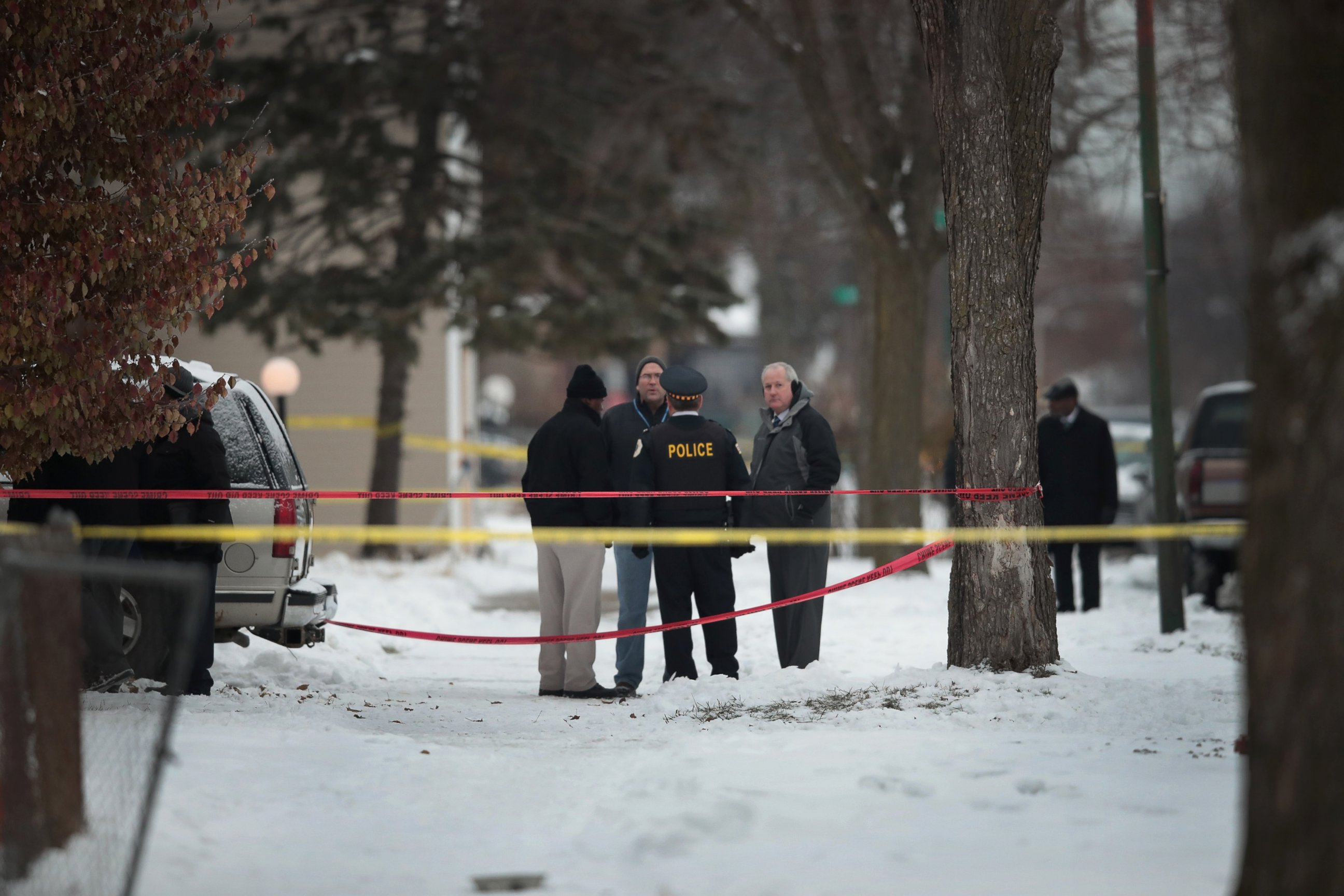 PHOTO: Police investigate the scene of a quadruple homicide on the city's Southside, Dec. 17, 2016 in Chicago.