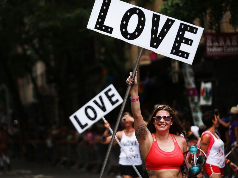 PHOTO: Participants in the annual New York Gay Pride Parade march in the West Village in Manhattan, June 25, 2017 in New York City. 